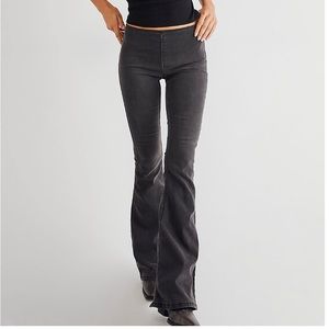 Penny pull-on flared jeans from Free People. Washed black. Size 29